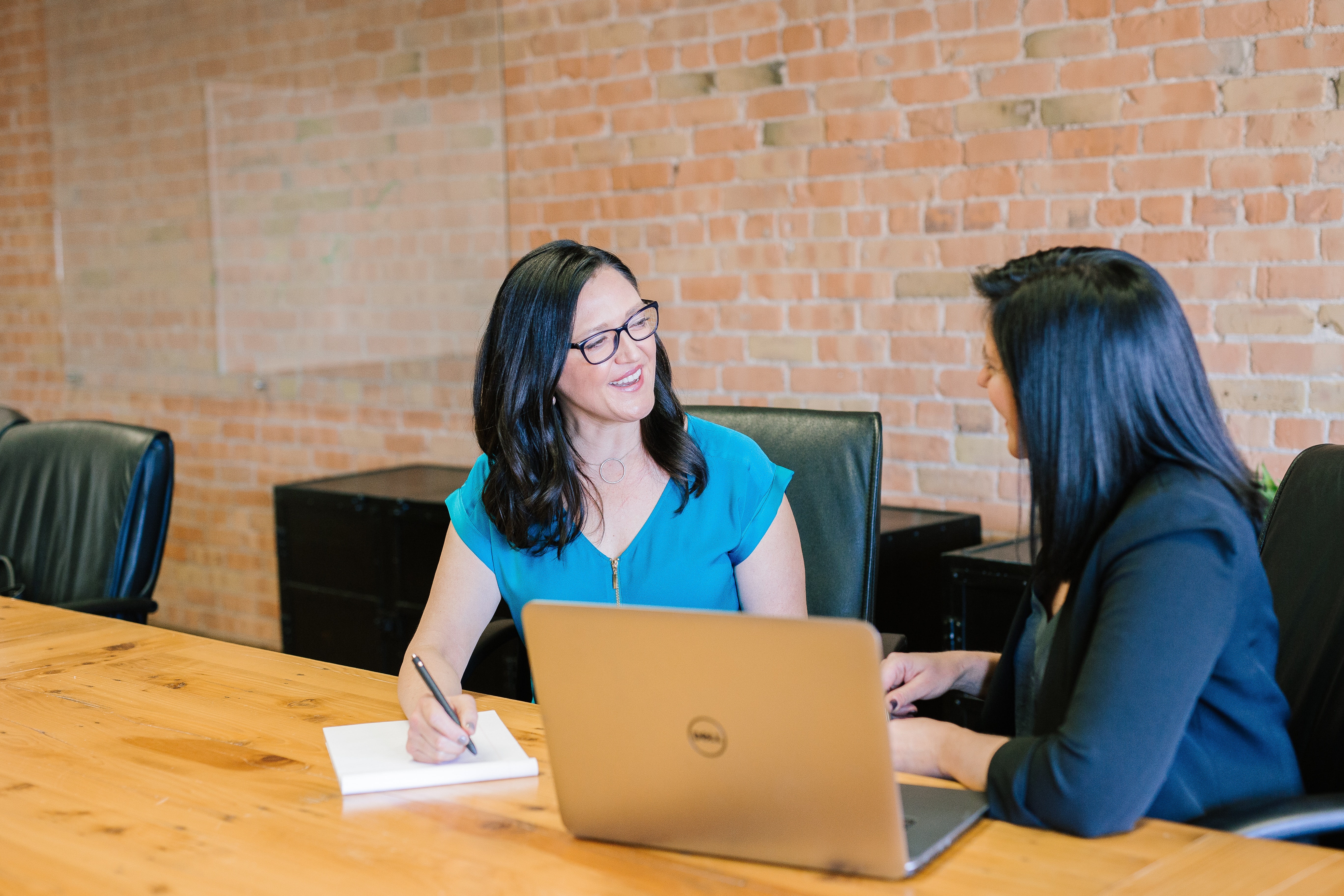 young woman in a meeting with an expert - foreclosure refinance