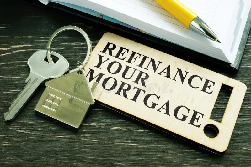 a key chain with label refinance your home - Will Refinancing Save Me Money